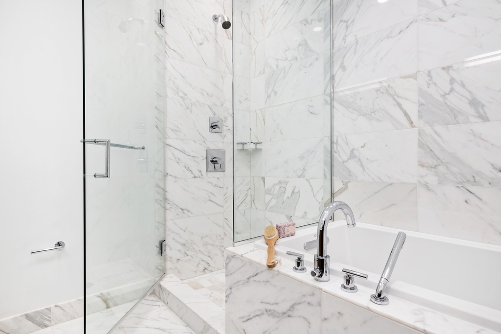 Modern,luxury,bathroom,with,white,marble,tile,shower,enclosure,with